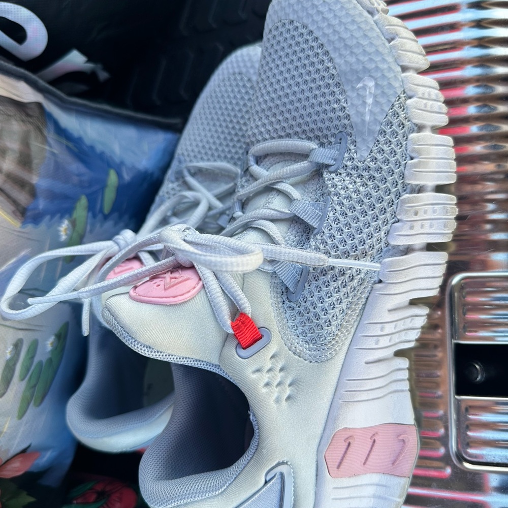 Nike Light Gray Sneakers with Pink Highlights